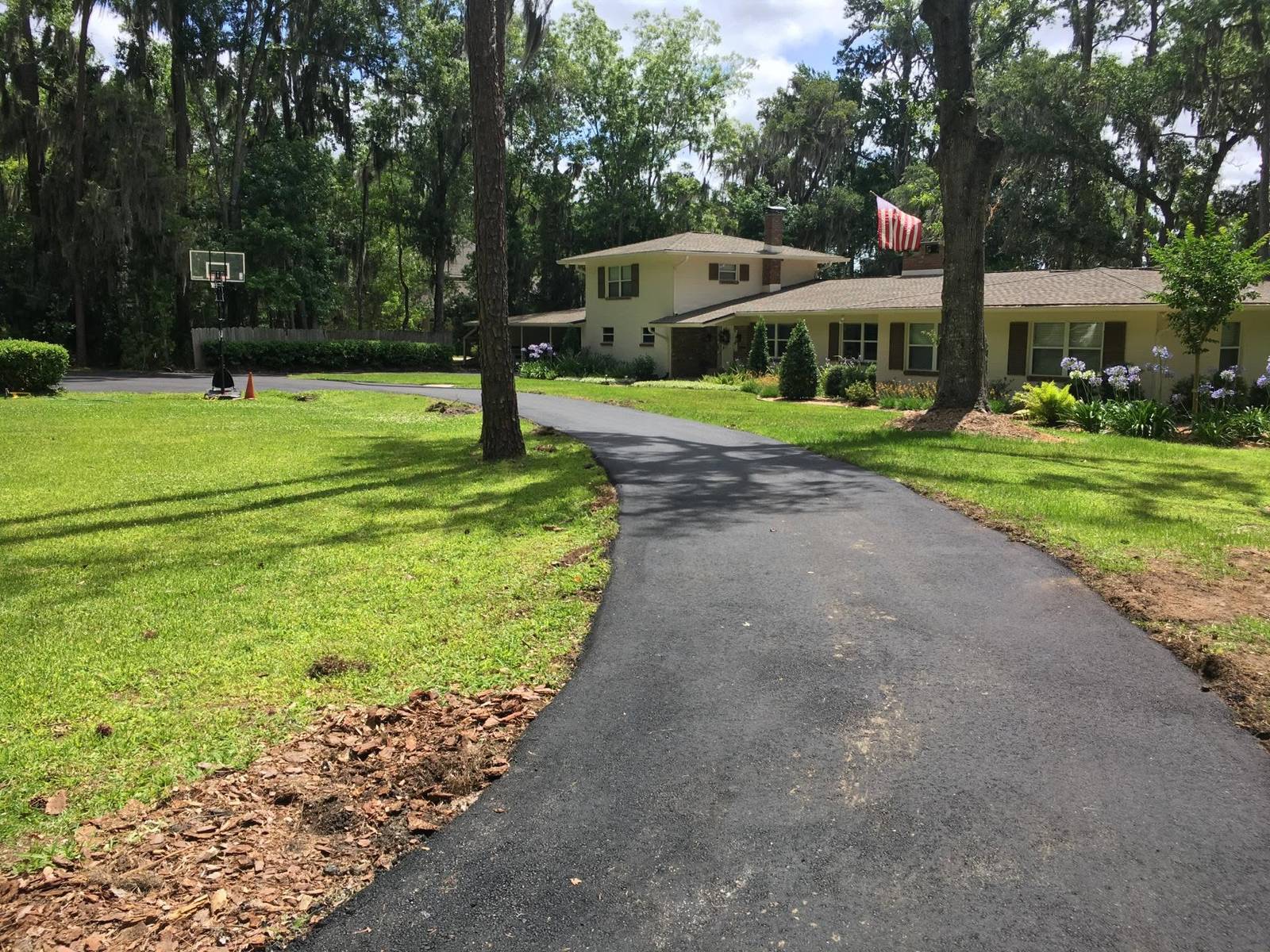 Brand new asphalt driveway at a Gainesville home
